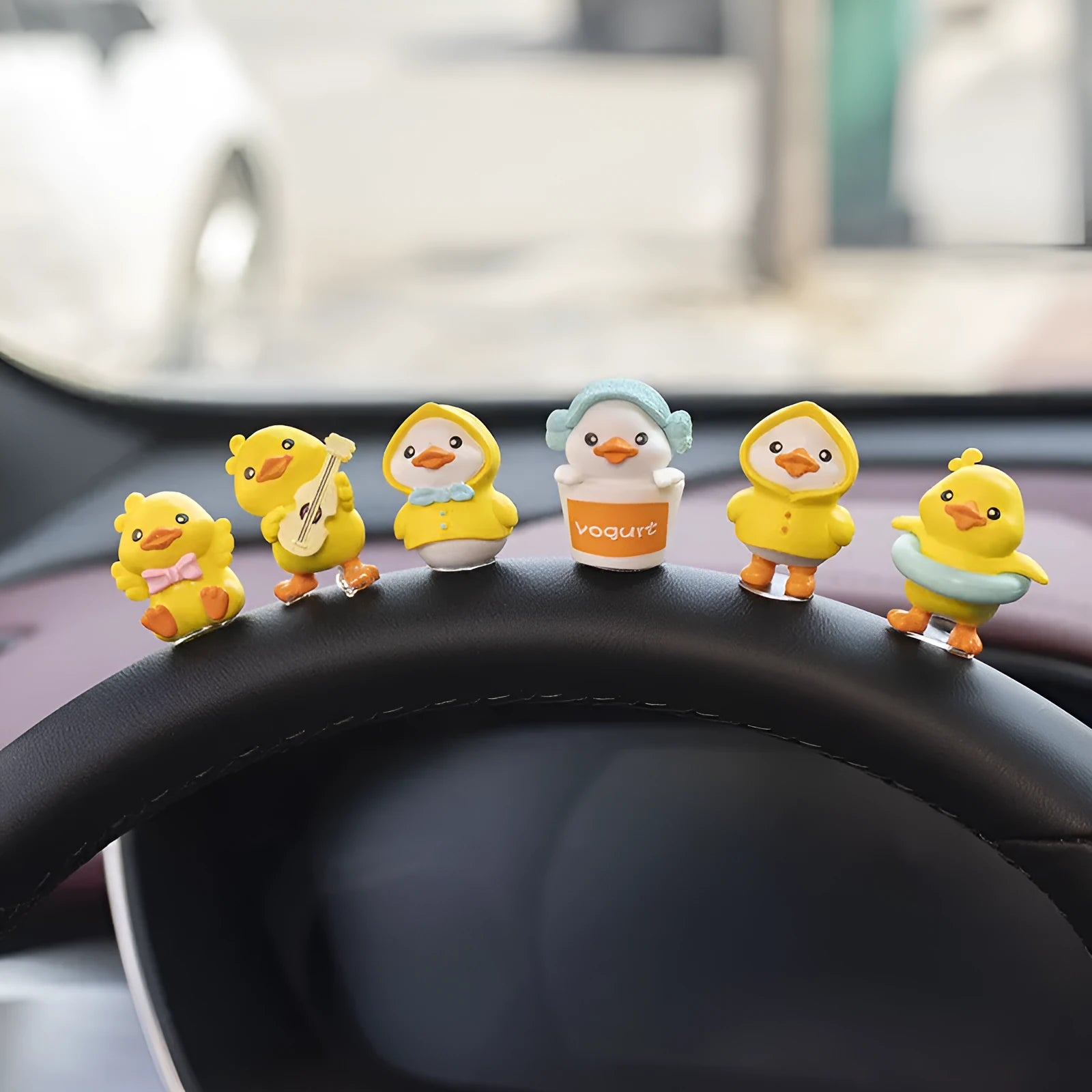 PVC duckling car decoration set with six cartoon duck ornaments and one greeting sign