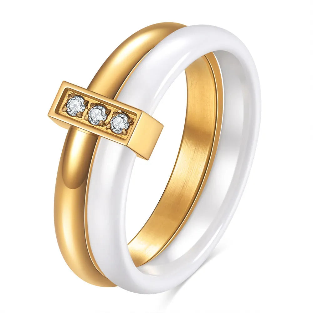 Ceramic ring with glossy stitching and inlaid zirconium in steel black or gold white colour, 6mm geometric shape