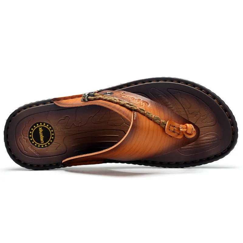Men's dark blue herringbone pattern outdoor slippers with leather lining and rubber sole, shown in a large size