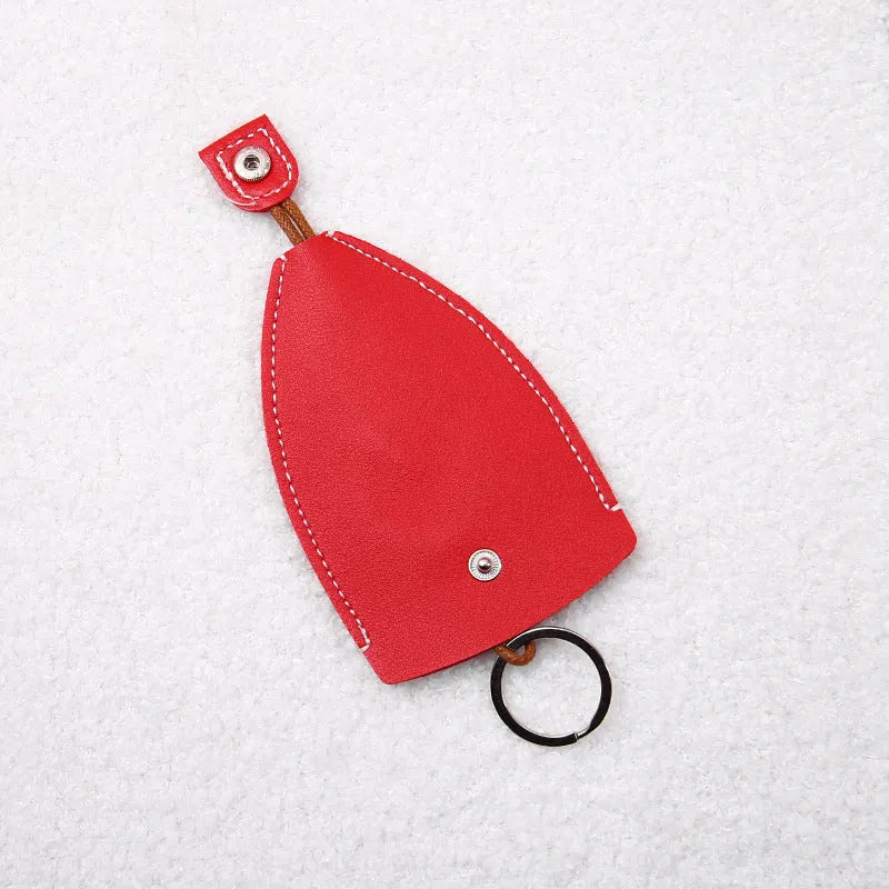 Colourful cartoon pull-out key case made from PU leather showing design options