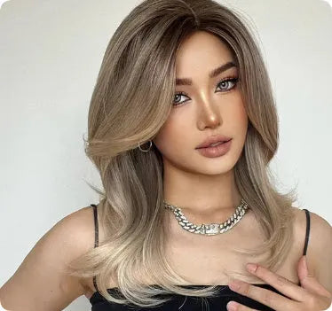 Mid-length curly synthetic wig with long fringe in a platinum gradient colour, available in brown, white gold and wine red.