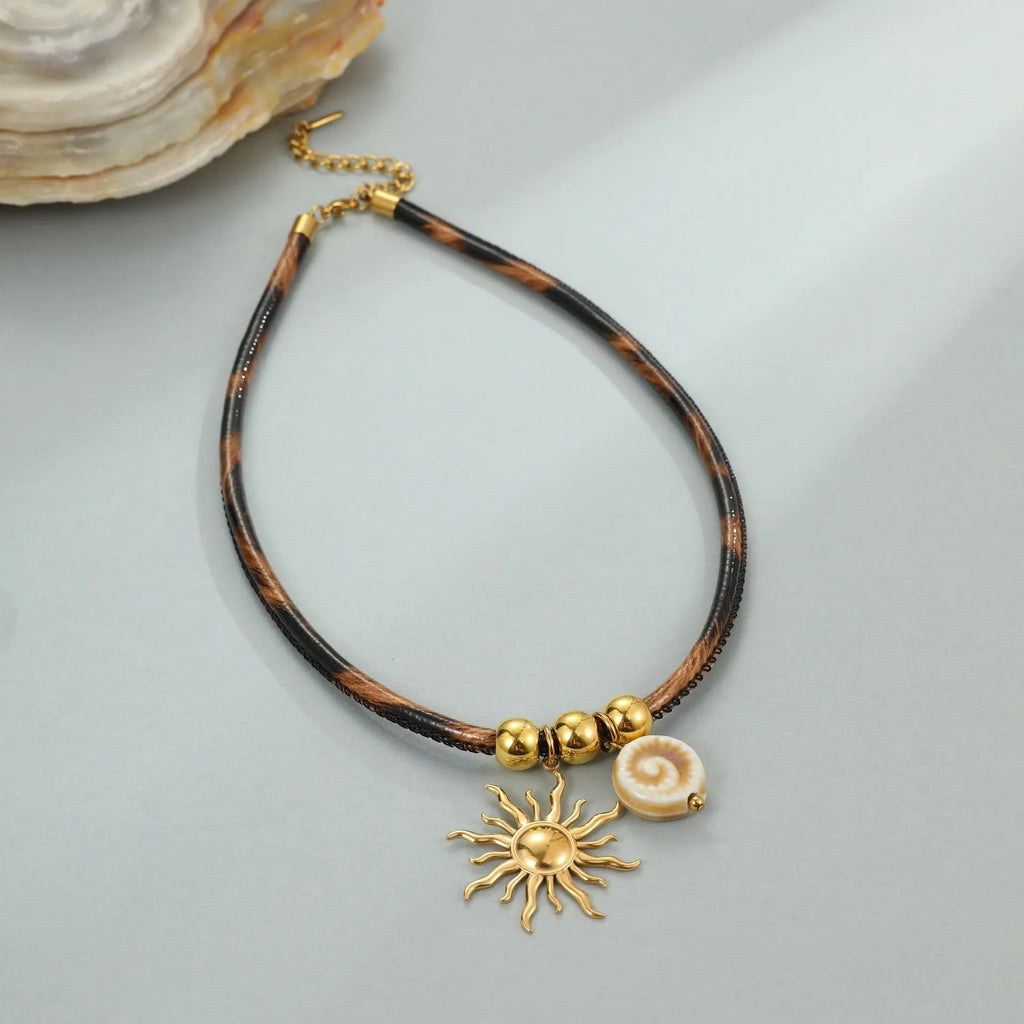 Geometric leopard pattern pendant necklace for women on an adjustable stainless steel chain with 18K gold plating.