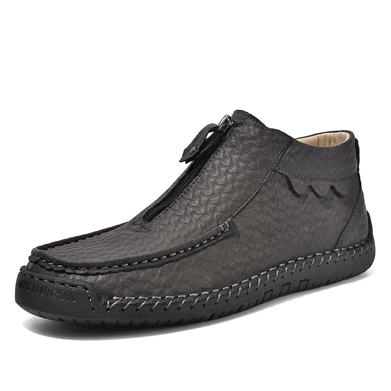 Men's black slip-on casual loafers with round toe and rubber sole.