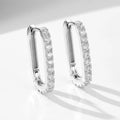 Sterling silver oval zircon ear clip earrings in yellow and white geometric design