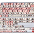 Pink PBT mechanical keyboard key cap with colourful fragrant pig character design on top and sides.