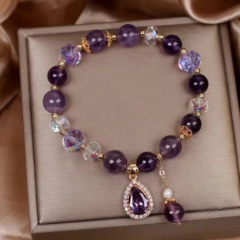 Purple amethyst crystal bracelet for women with micro inlay detail.