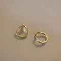 S925 Sterling Silver fishtail drop earrings in gold and white gold tone finishes.