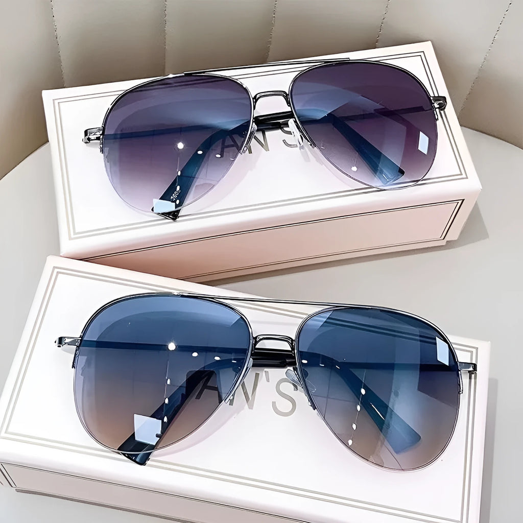 Metal aviator sunglasses with UV protection resin lenses in various colour options.