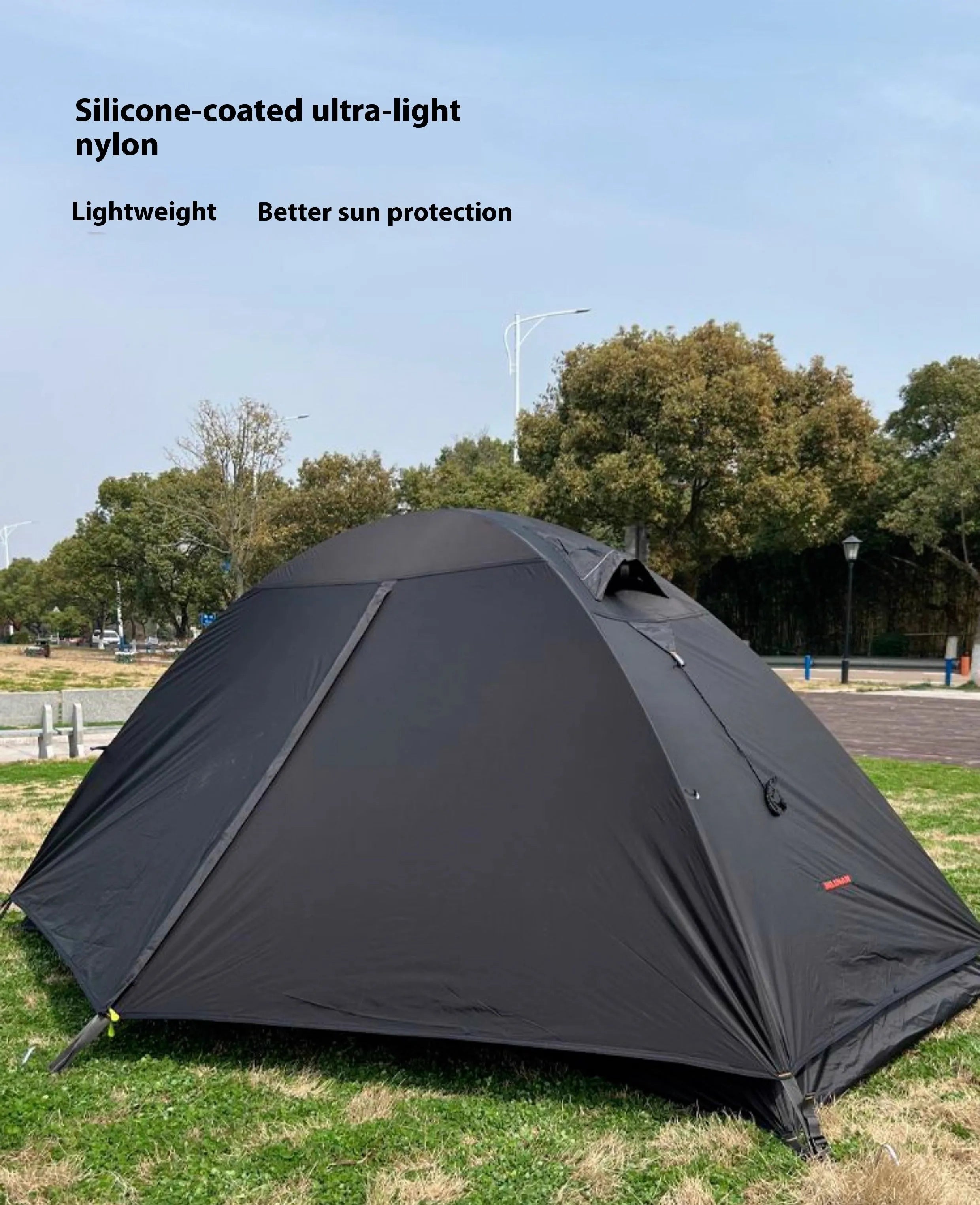 Single person camping tent with aluminium poles in red colour showing double-layer construction
