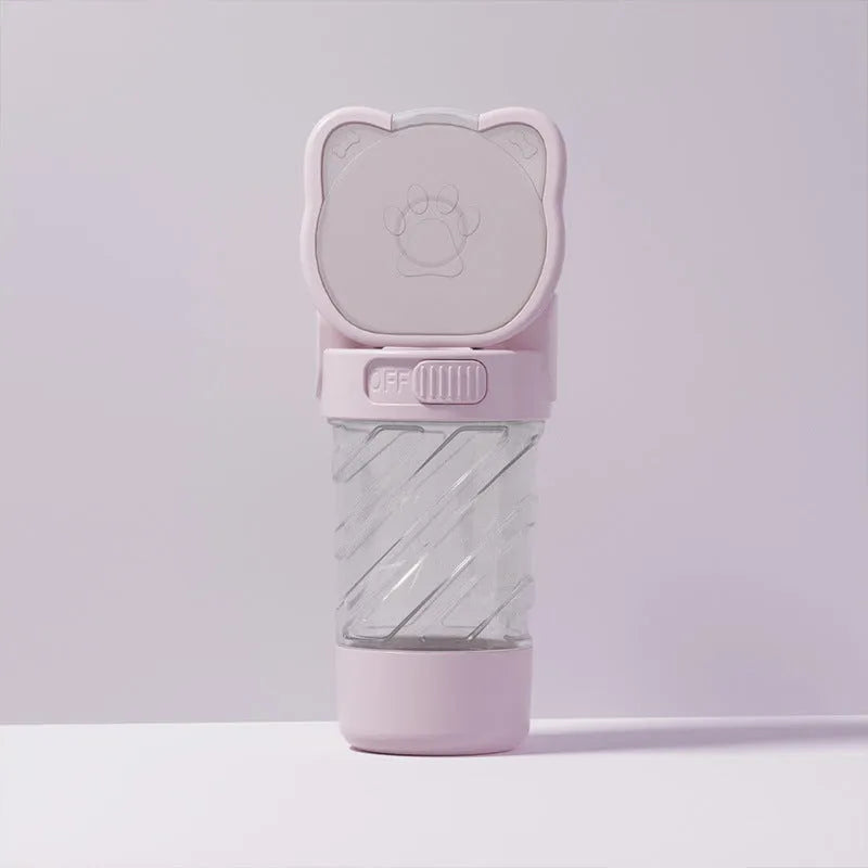 Green, pink, and white 3-in-1 portable pet water bottle with food container and bag dispenser
