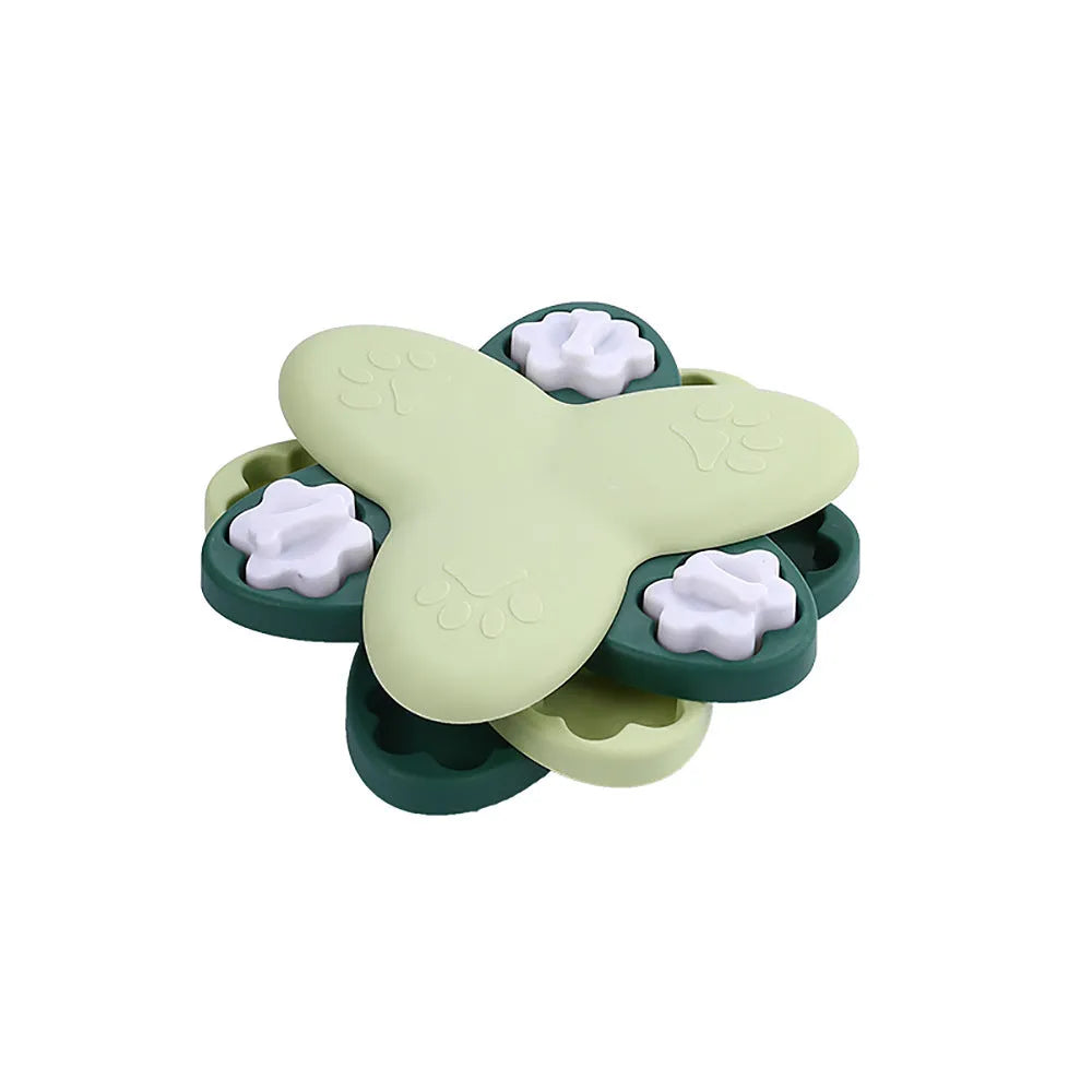 Green and yellow dog puzzle toy with bone-shaped covers and non-slip base.