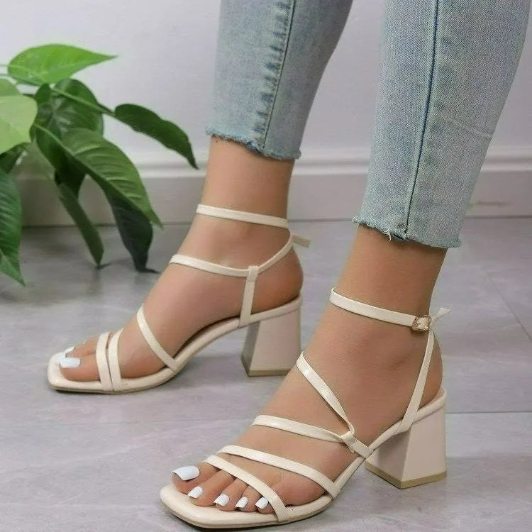 Plus size women's open toe ankle strap sandals in beige with a square toe and rubber sole.
