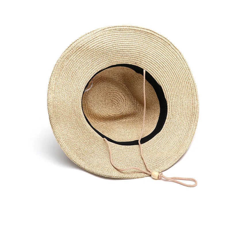 Men's foldable straw sun hat with wide brim in beige colour shown from side view