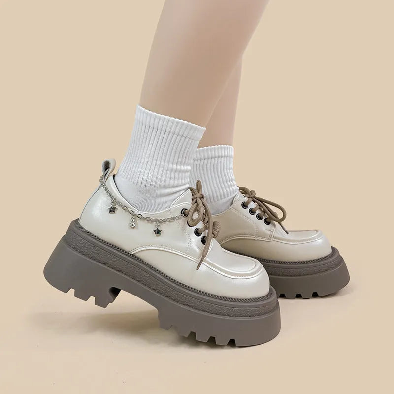 White women's platform leather shoes with chunky heel and front lace-up, round toe.