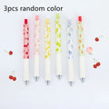 Three fruit-themed scented pressurised pens with 0.5mm black ink refills on writing surface