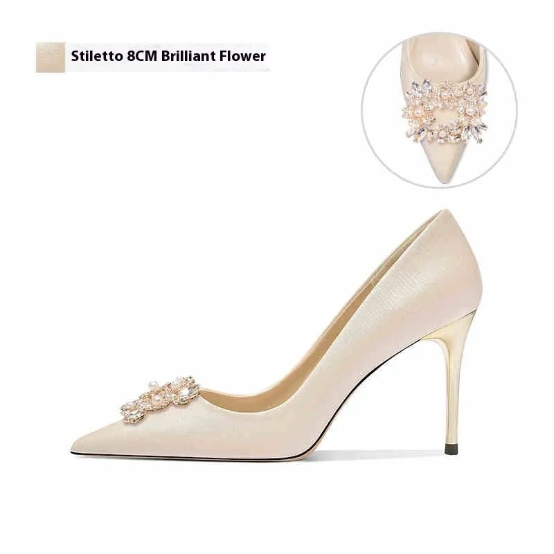 Rhinestone decorated women's high heel pumps in pointed toe style with cat heel or stiletto options.