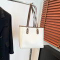 Korean style horizontal square shoulder underarm bag in PU material with a sandwich pocket.