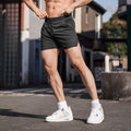 Men's straight leg polyester sports shorts in black, grey, navy, or red.