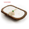 Lavender-scented soy wax aromatherapy candle in a light wooden basin.