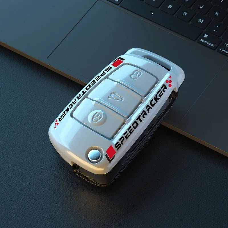 Carbon fibre style car key cover in carbon and white colours with mirror element