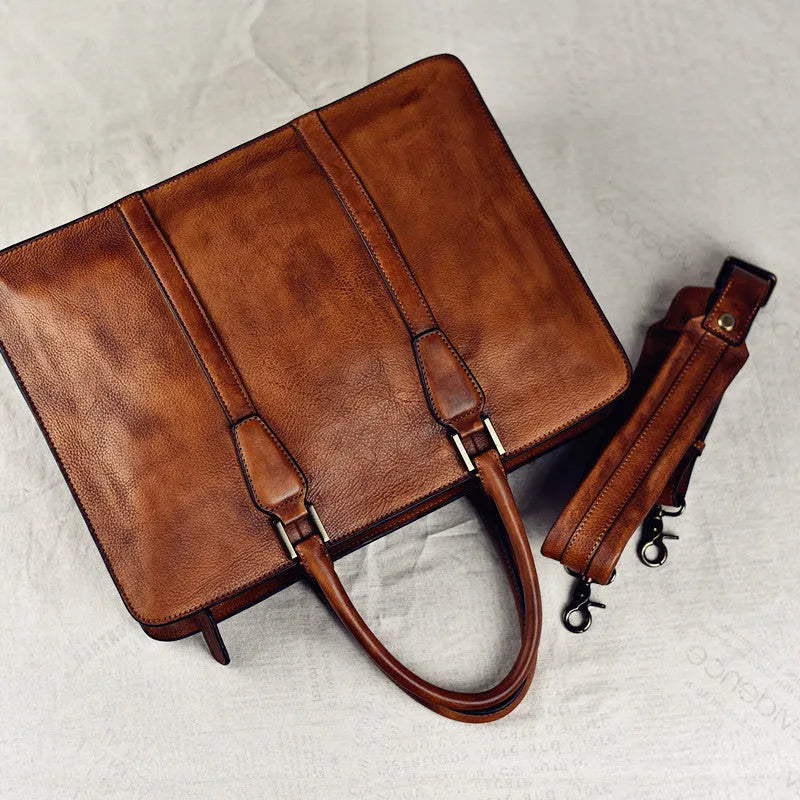 Men's retro brown leather handbag with horizontal 14-inch design and zippered opening
