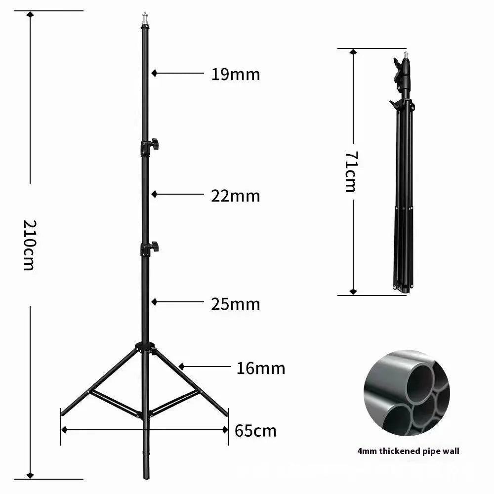 A 2.1 metre tall frosted silver tripod light stand with a mobile phone holder attached, on a studio floor.