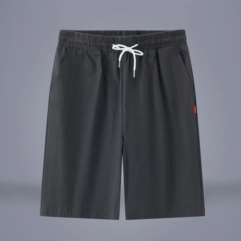 Casual cropped trousers in cotton-linen fabric with a drawstring waist, shown in a solid colour.