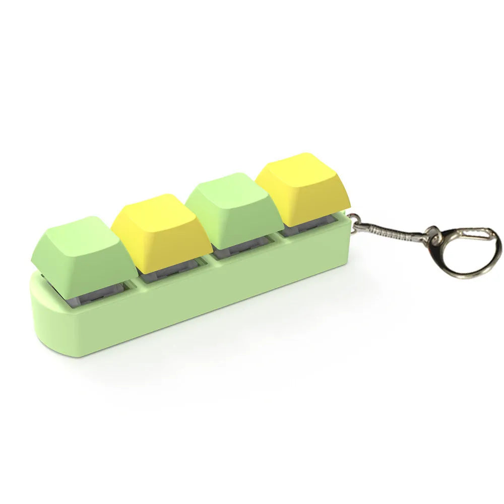 A compact mechanical keyboard switch tester with four different coloured keycaps and an included keycap puller.