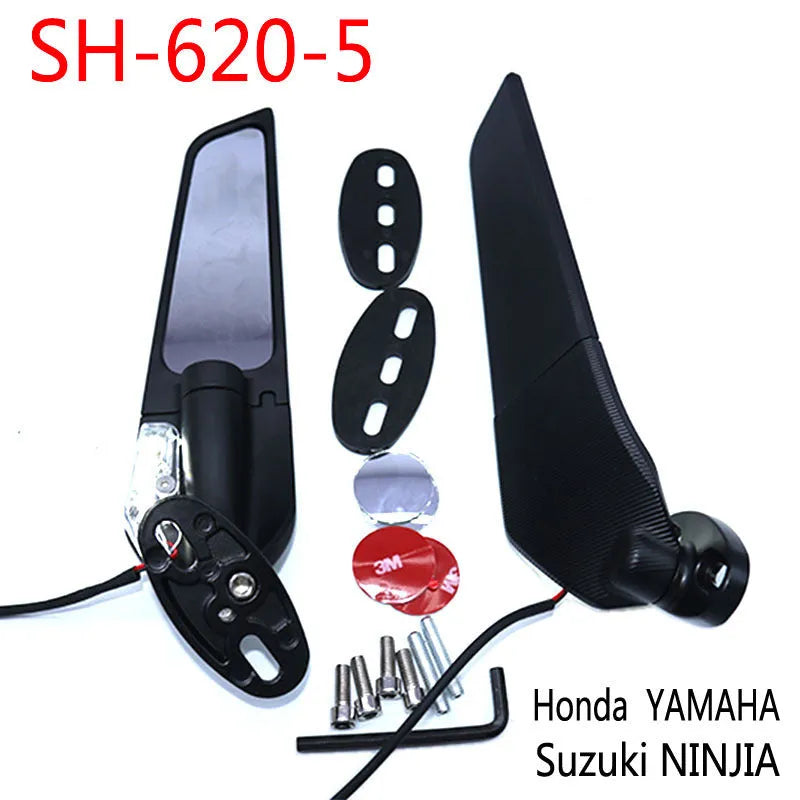 Pair of yellow-light aluminium motorcycle rearview mirrors with convex glass lenses.