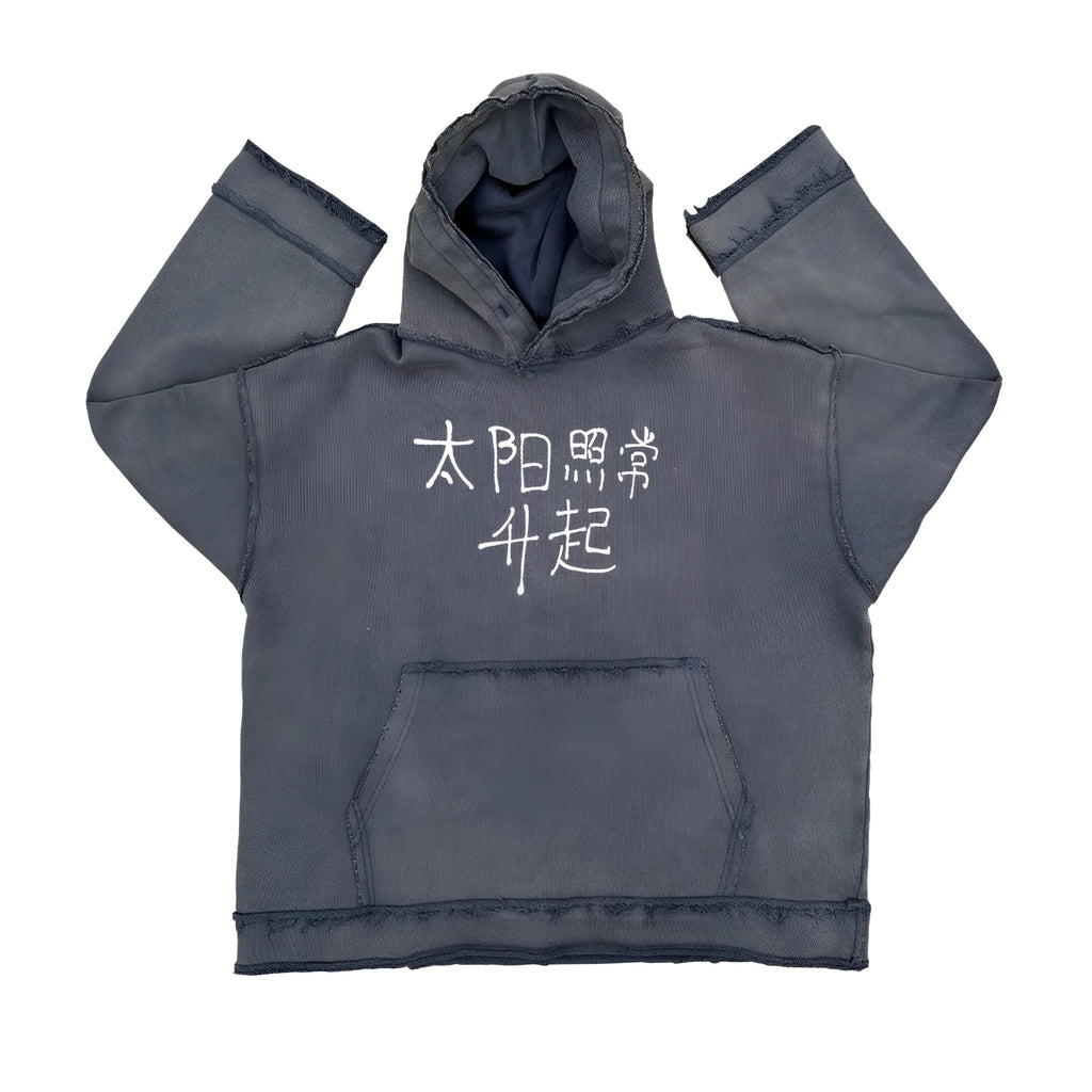 Dark blue back-to-front hoodie sweater on a model