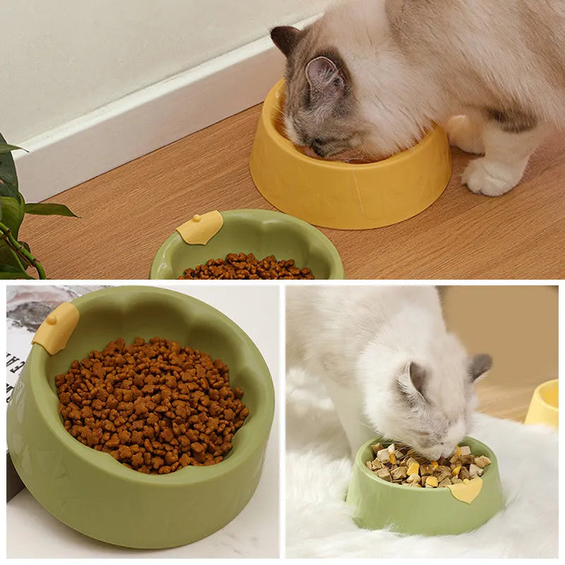 Green plastic double bowl for dog and cat food and water with anti-tip base.