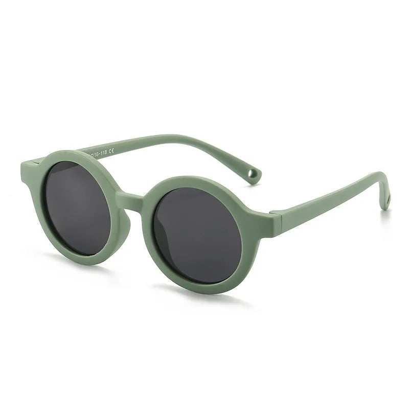 Soft silicone round-frame sunglasses for babies and toddlers aged 0-3 years with polarised UV400 lenses.