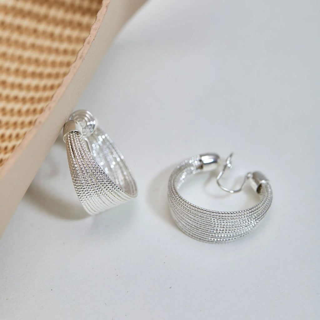 Geometric simple bracelet earrings for women in silver and gold with stud and clip style options
