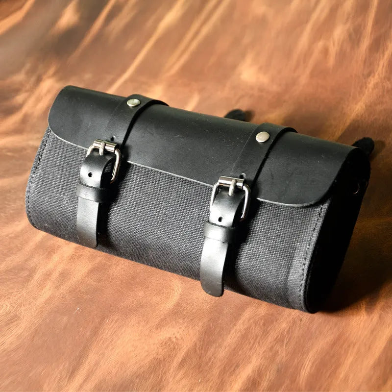 Camel Bag Knight cotton motorcycle helmet messenger bag with rivet details and internal organiser pockets.