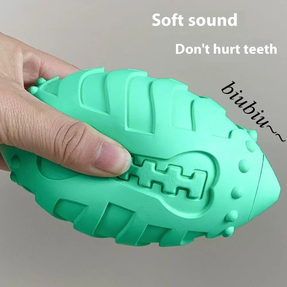 Light green thickened rubber rugby ball dog toy with bite-resistant construction.