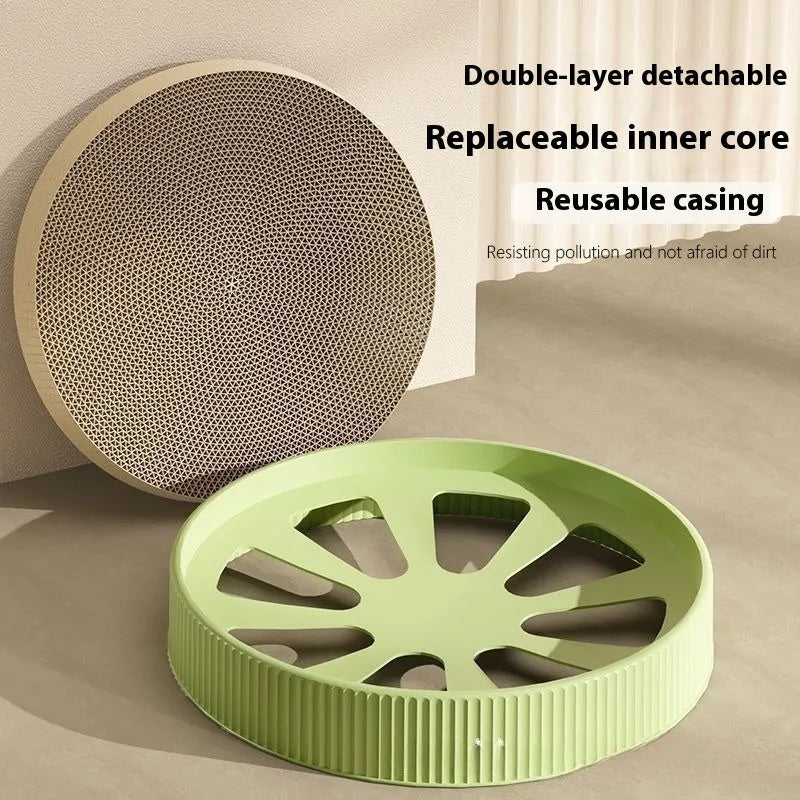 Green round corrugated cardboard cat scratching board measuring 55cm with two replacement pads.