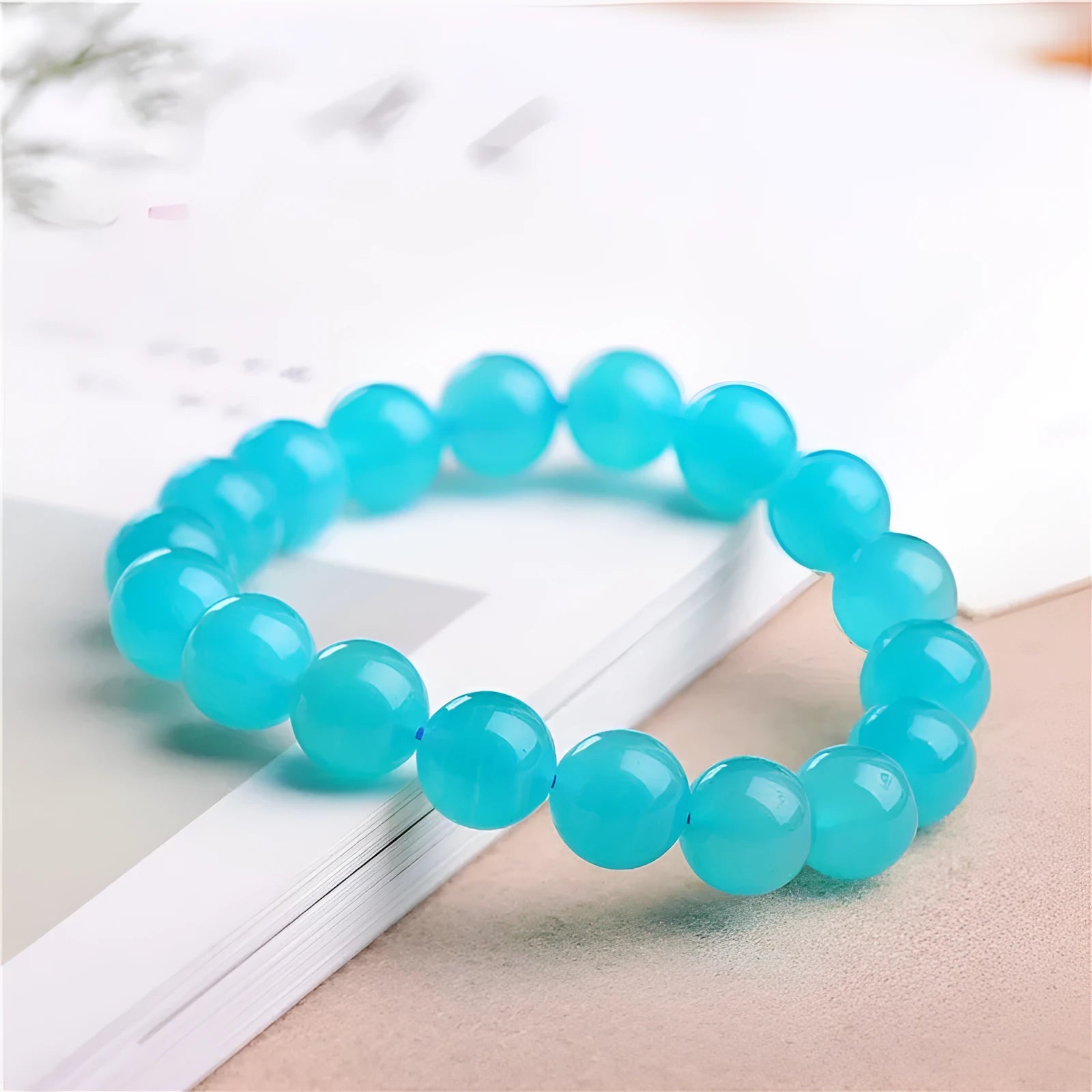 Natural Amazonite crystal bracelet with scattered polished beads in ice colour variations