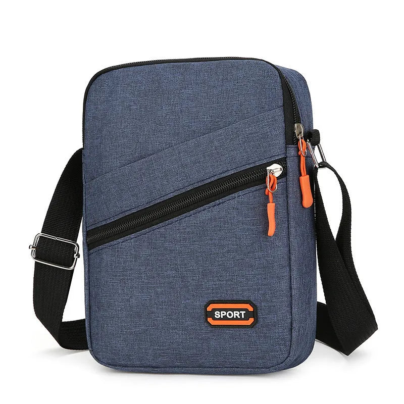 Solid colour Oxford cloth crossbody commuter bag with contrast details in silver grey.