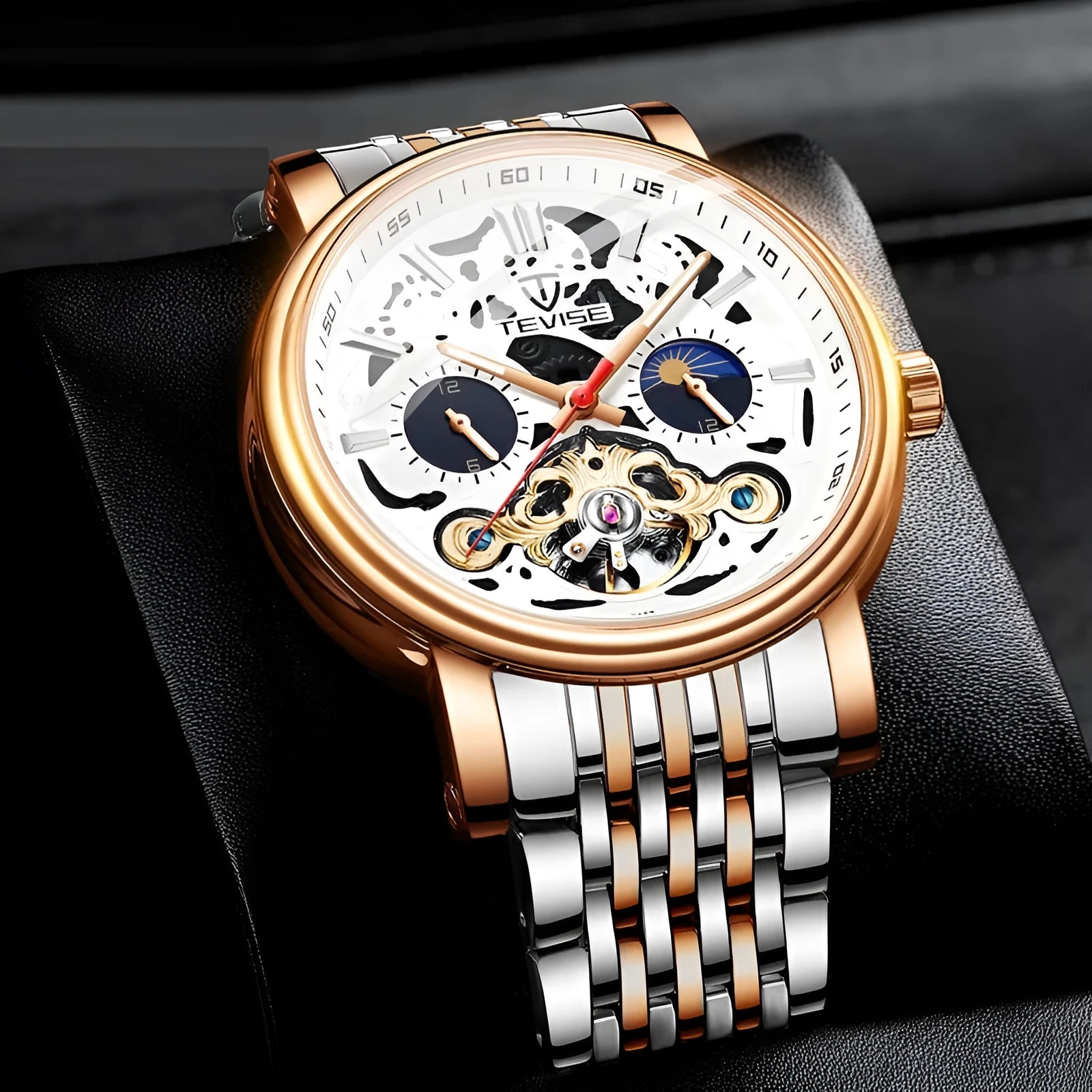 Men's black tourbillon mechanical watch with luminous hands on a leather strap, showing 16.5mm thickness.