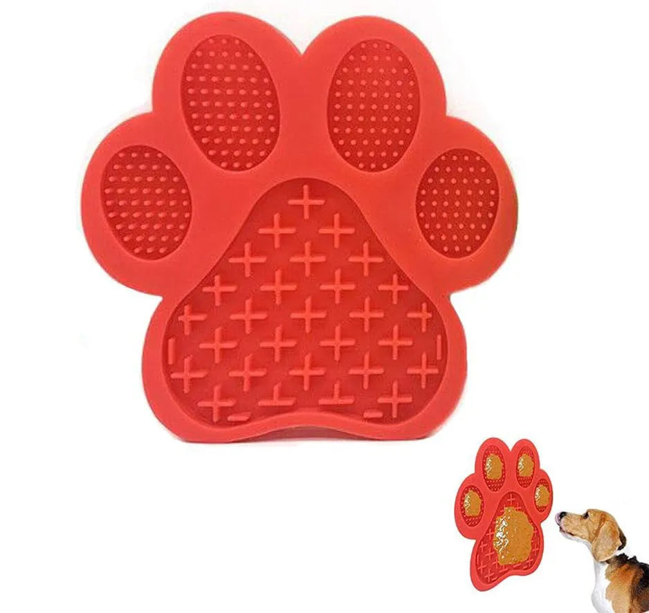 Blue bone-shaped silicone dog licking mat with suction cups on the back for sticking to smooth surfaces.