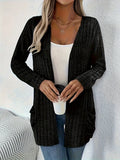 Solid colour loose fitting long sleeve cardigan with front pockets in Grandma grey