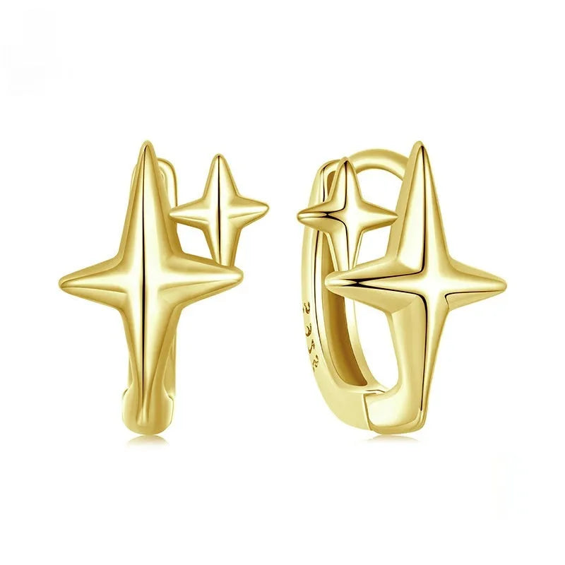 Sterling silver minimalist star ear clip accessories with oxidised finish on ear