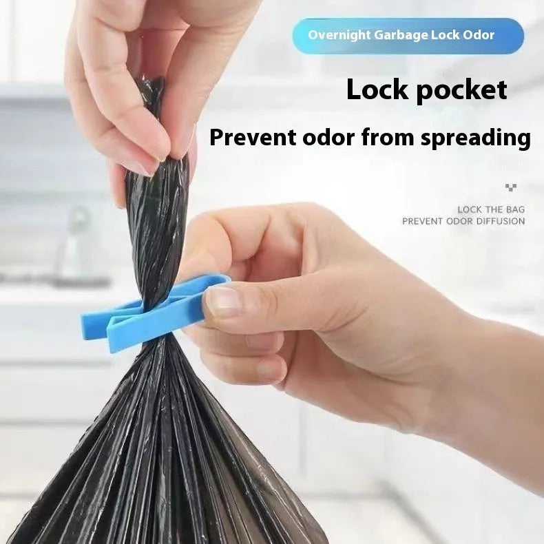 Non-slip plastic fixing clip for holding rubbish bags onto the side of a bin.
