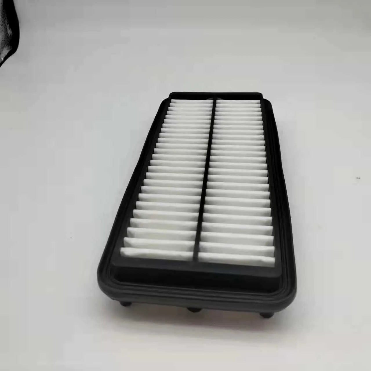 Black car air filter replacement part measuring 256mm by 113mm by 40mm for Modern vehicles