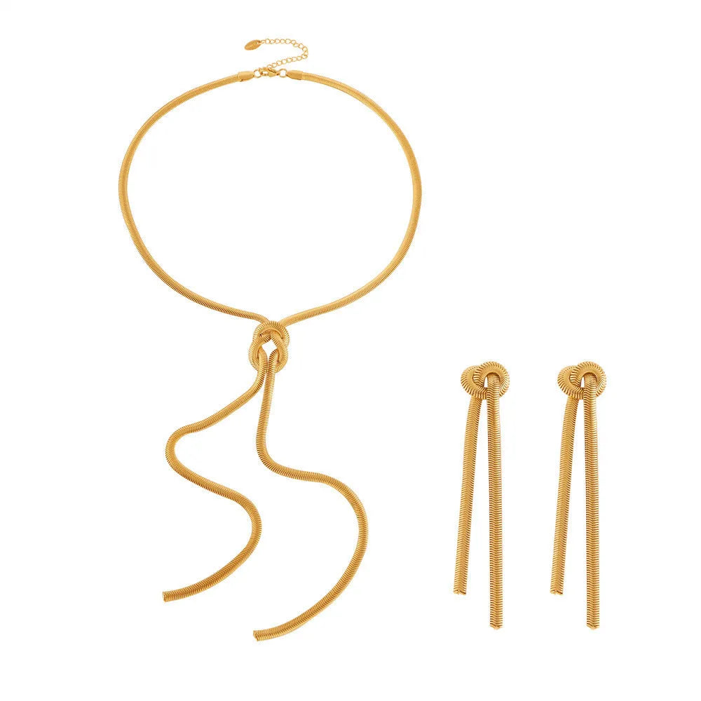 Gold titanium steel necklace with knotted tassel pendant and matching earrings set