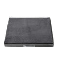 Brown removable washable memory sponge dog mattress pad on a wooden floor.