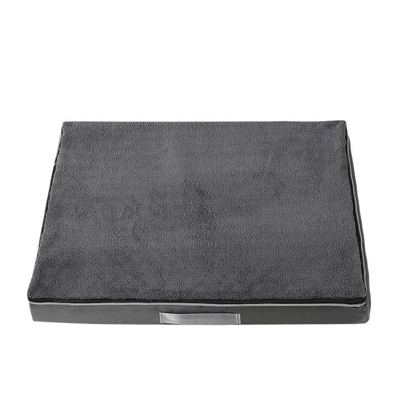 Brown removable washable memory sponge dog mattress pad on a wooden floor.