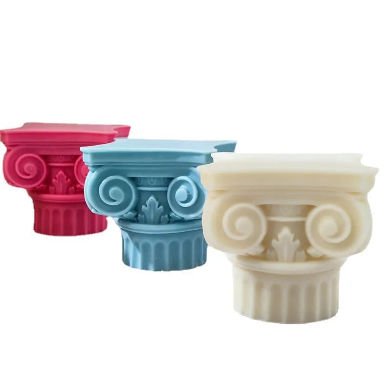 A flexible silicone mould in the shape of an irregular Roman pillar for making candles, chocolate, and crafts.