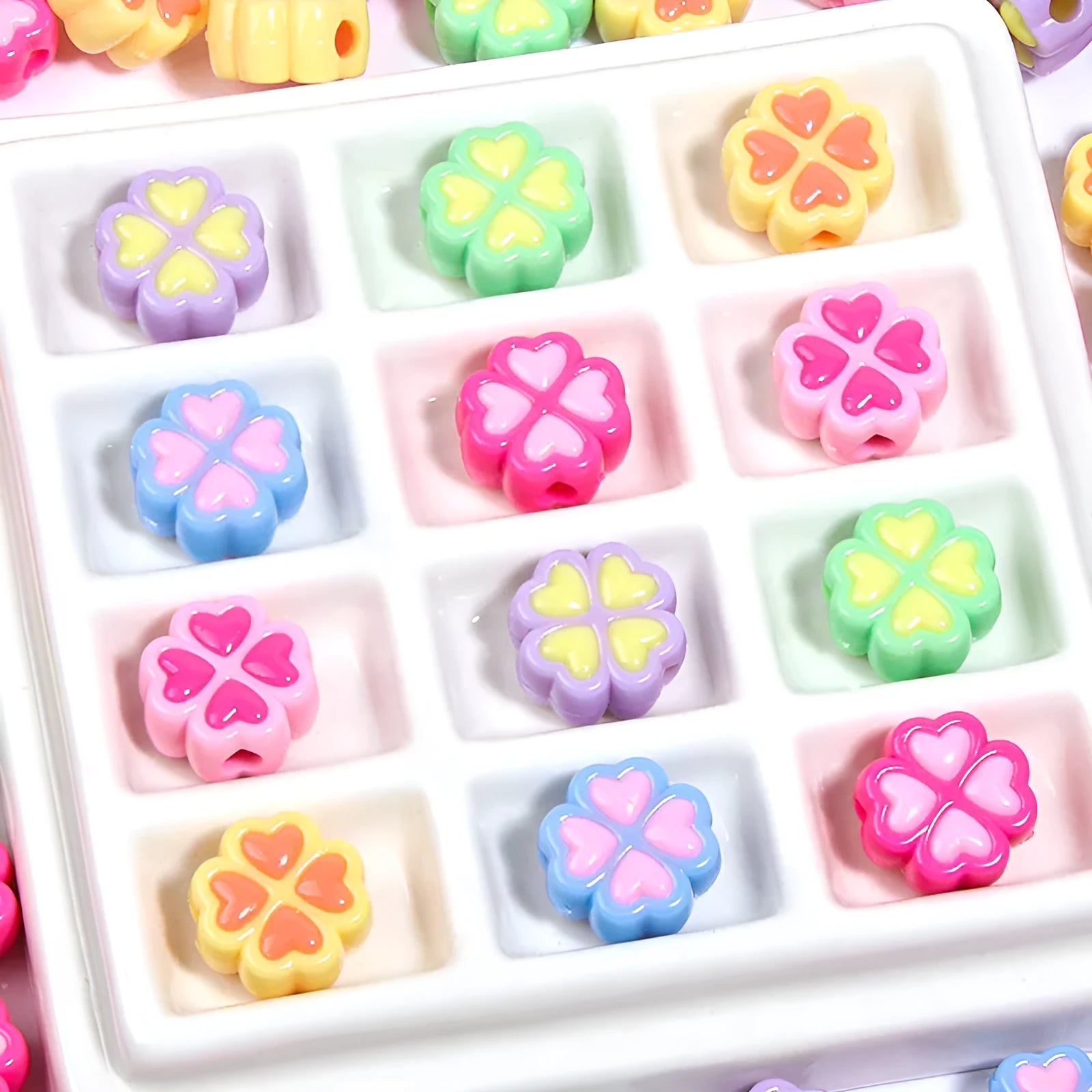 15mm acrylic four-leaf clover beads with frosted finish in various colours including rose red, pink, yellow, green, blue, purple