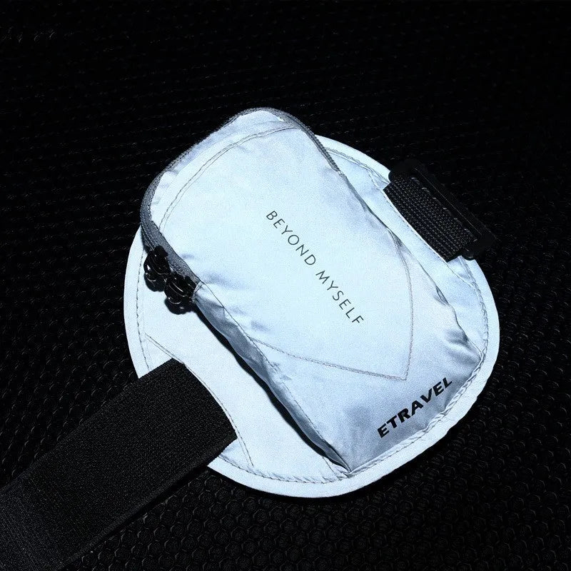 Reflective running arm bag with adjustable strap in fluorescent yellow, black, or silver grey.